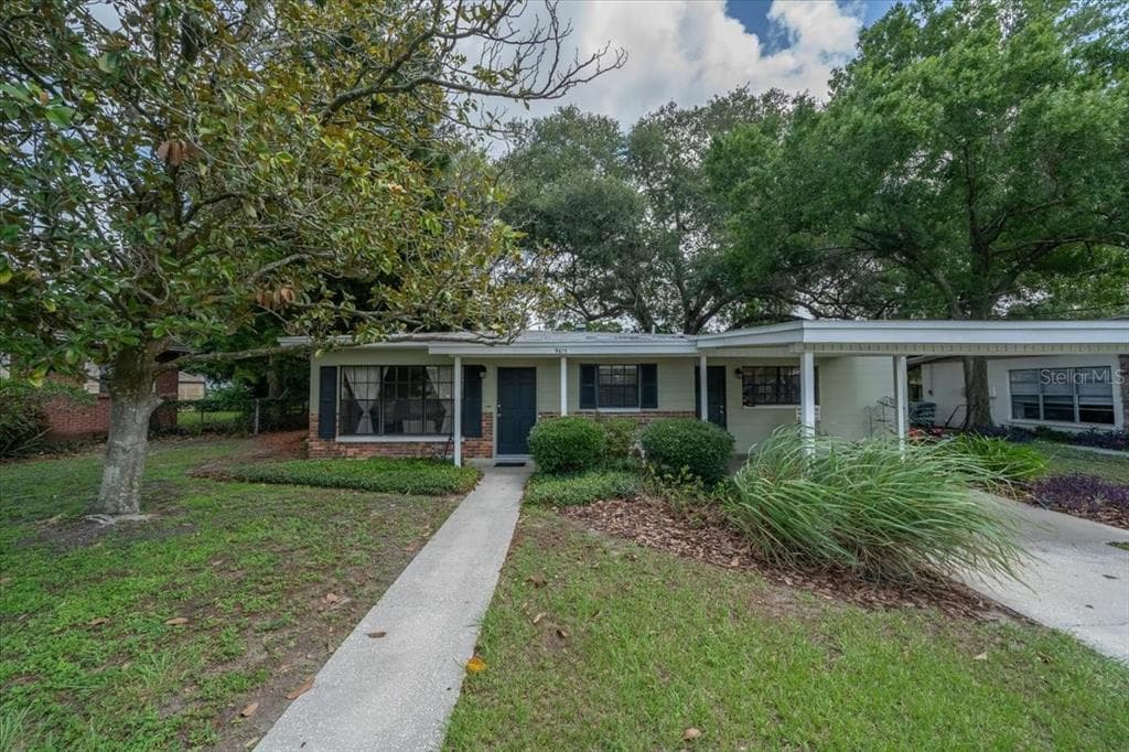 9613 ORANGE GROVE DRIVE TAMPA, FL 33618