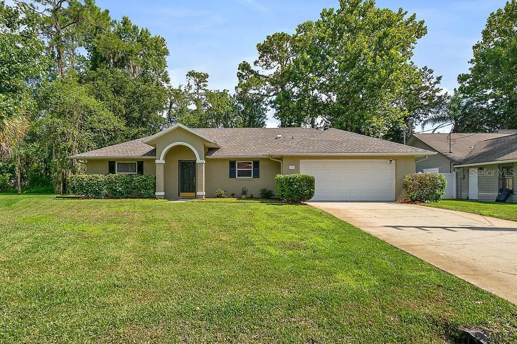 67 WOODLAWN DRIVE PALM COAST, FL 32164