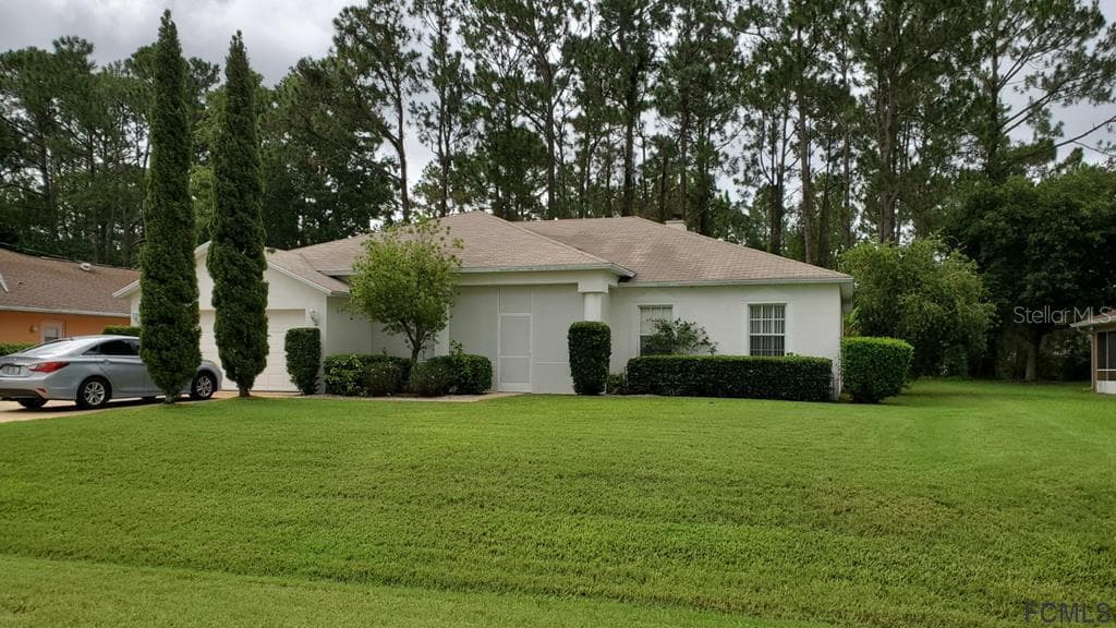 24 BURNING BUSH DRIVE PALM COAST, FL 32137