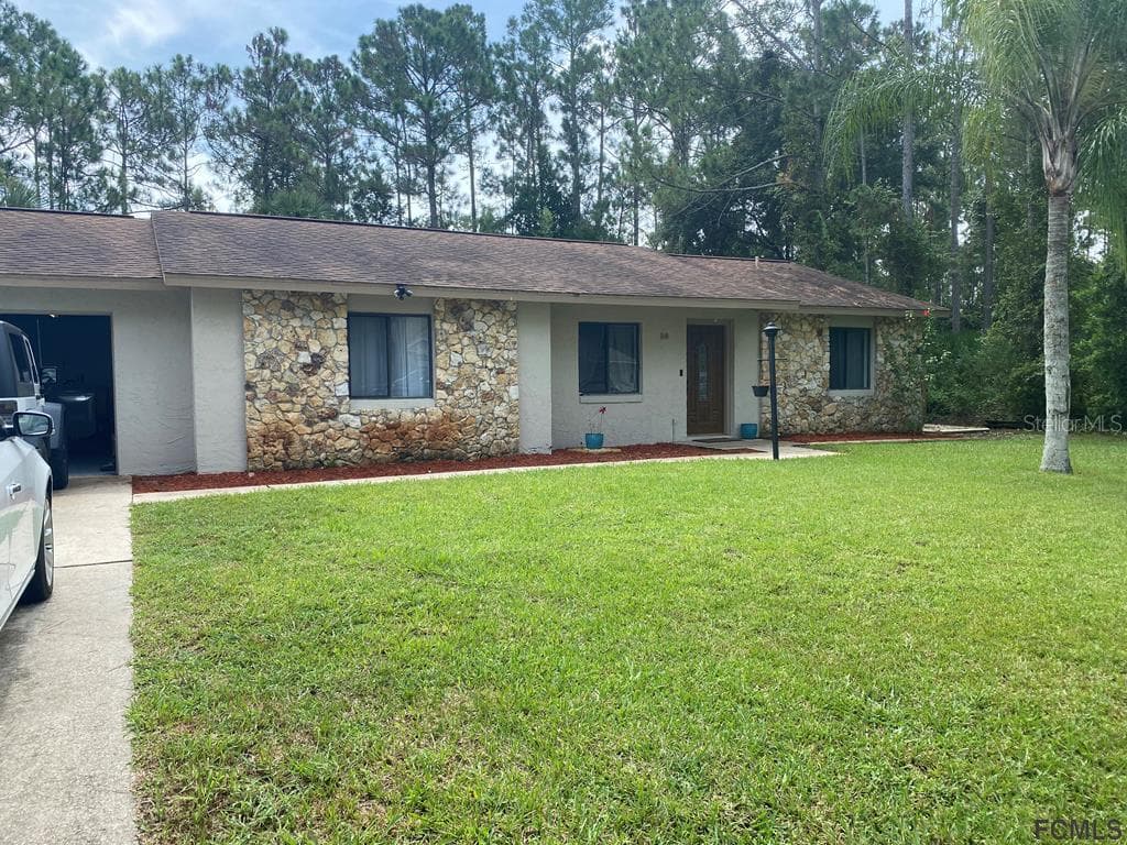 56 RAMBLEWOOD DRIVE PALM COAST, FL 32164