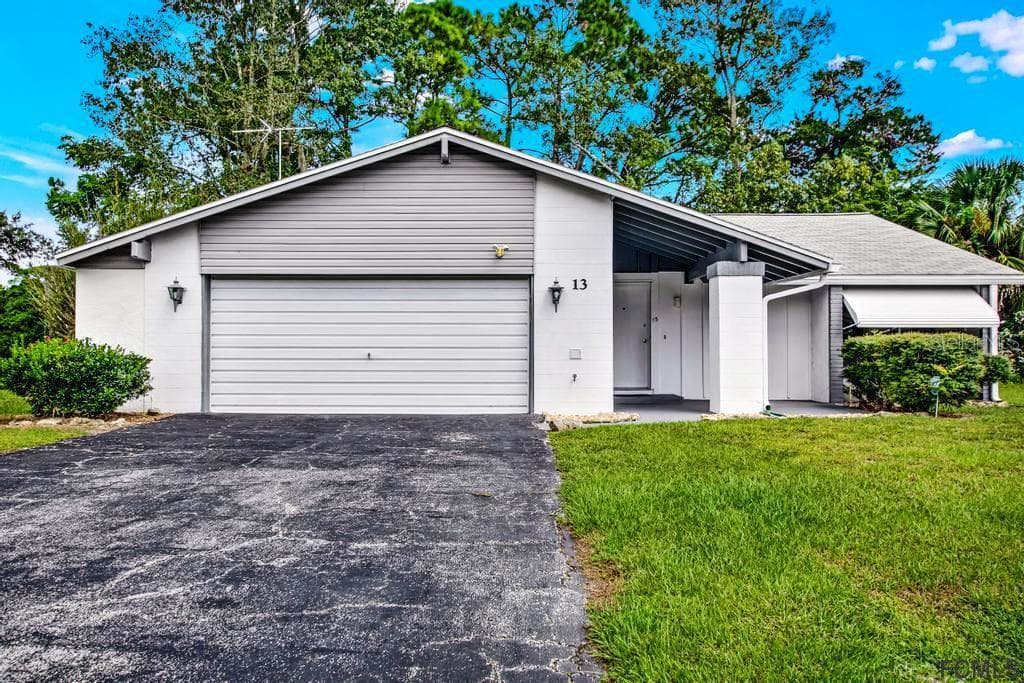 13 COOPER LANE PALM COAST, FL 32137