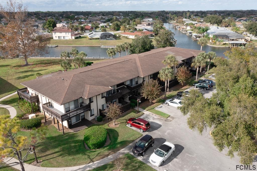 56 CLUB HOUSE DRIVE UNIT 107 PALM COAST, FL 32137