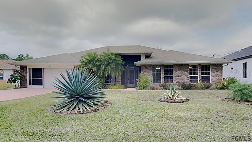 27 BURNING BUSH DRIVE PALM COAST, FL 32137