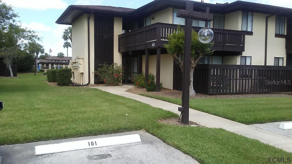 48 CLUB HOUSE DRIVE UNIT 101 PALM COAST, FL 32137