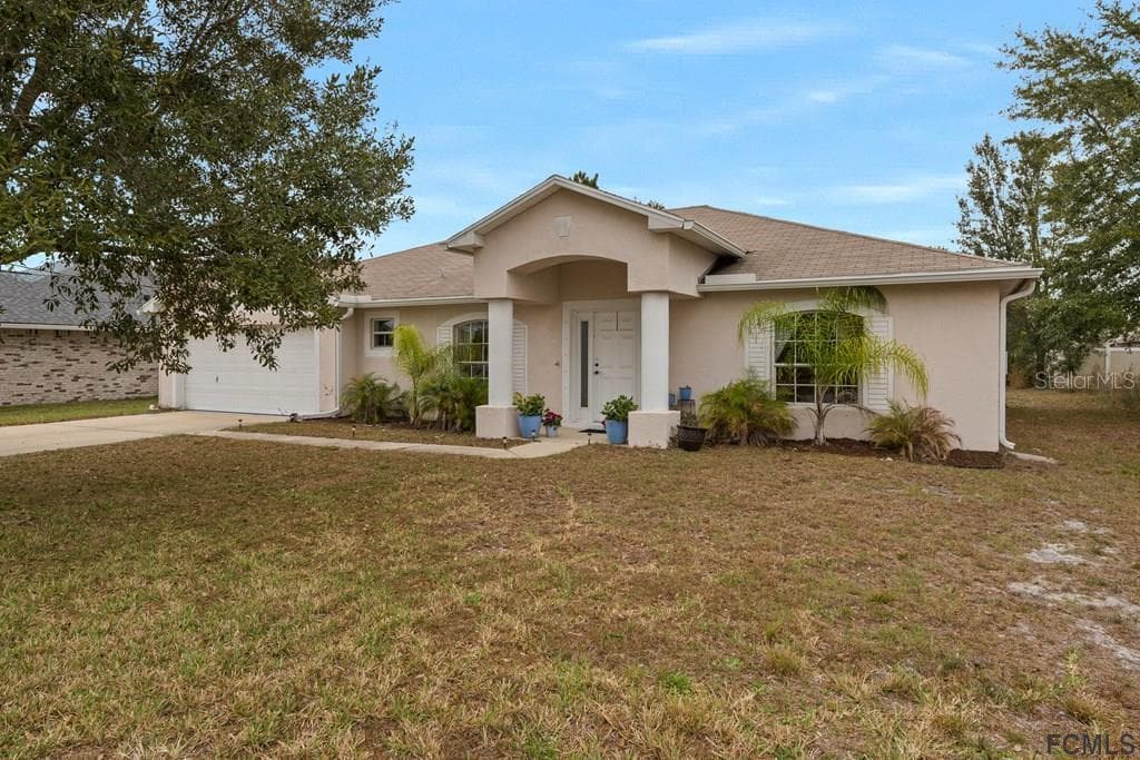 21 LOUISBURG LANE PALM COAST, FL 32137