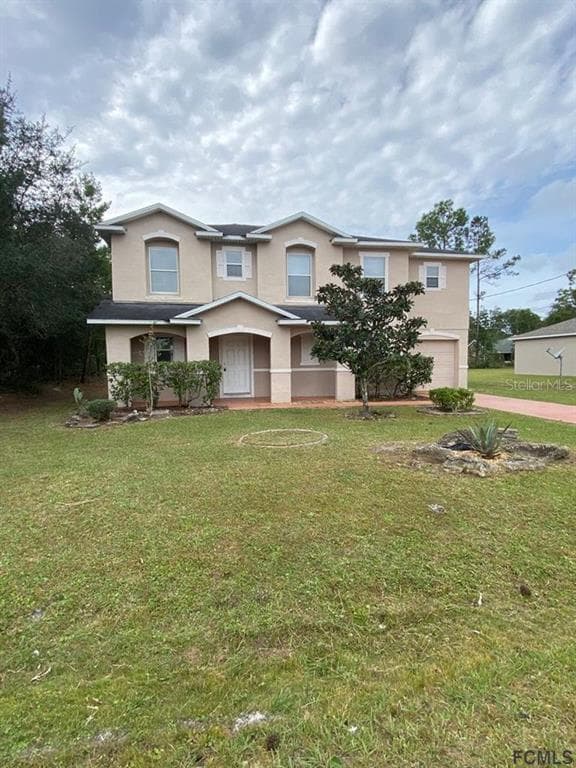 46 ROLLING FERN DRIVE PALM COAST, FL 32164