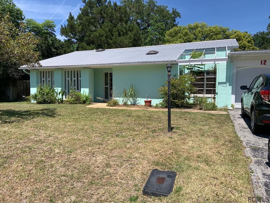 12 CROMPTON PLACE PALM COAST, FL 32137