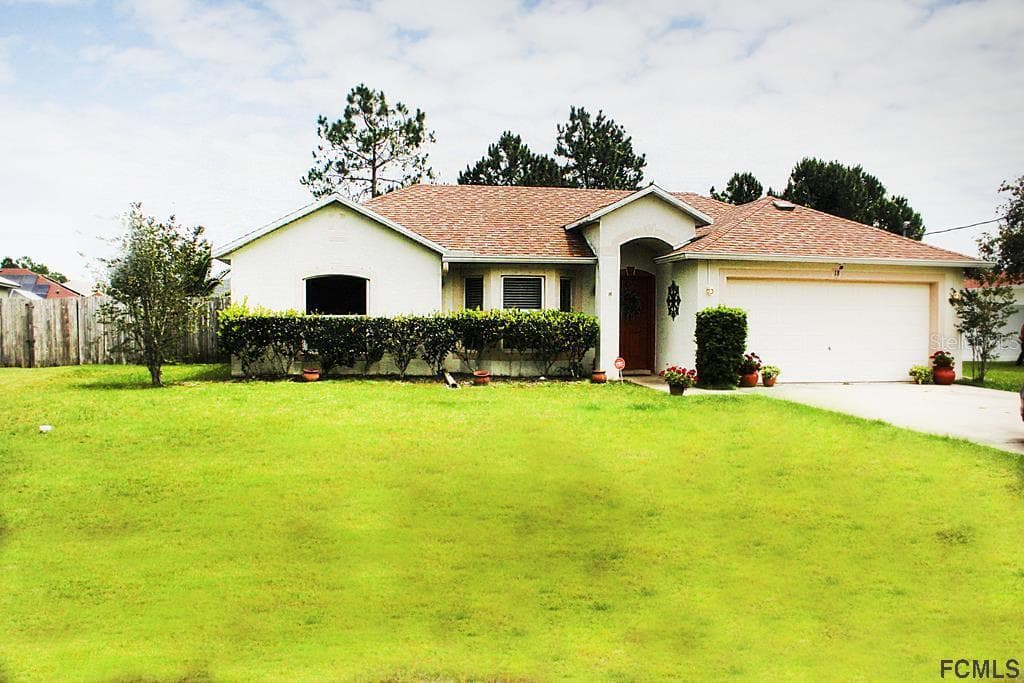 18 LANSDOWNE LANE PALM COAST, FL 32137