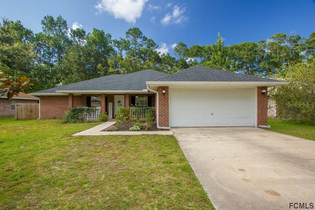 79 WOODSIDE DRIVE PALM COAST, FL 32163