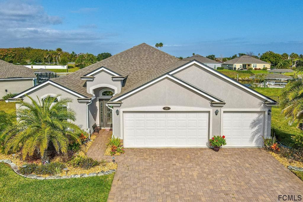 50 COUNTRY CLUB HARBOR CIRCLE PALM COAST, FL 32137