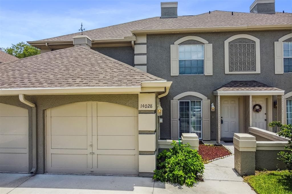 14028 TROUVILLE DRIVE TAMPA, FL 33624