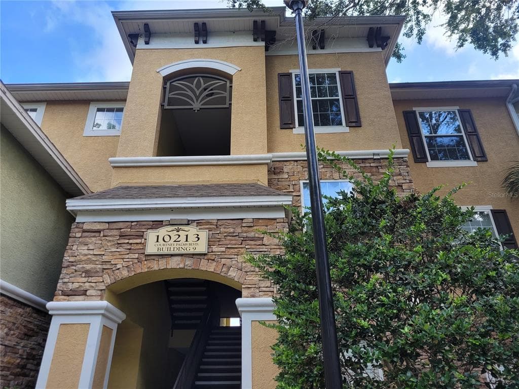 10213 COURTNEY PALMS BOULEVARD UNIT 101 TAMPA, FL 33619