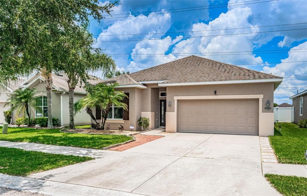 7920 CAMDEN WOODS DRIVE TAMPA, FL 33619
