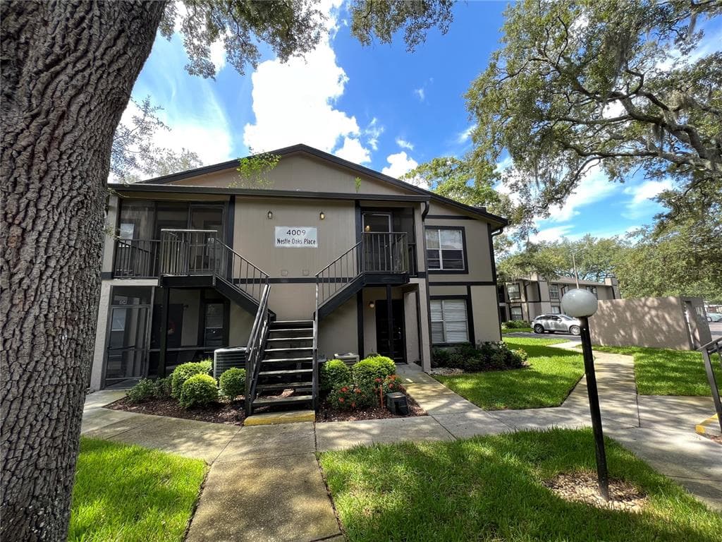 4009 NESTLE OAKS PLACE UNIT 103 TAMPA, FL 33613