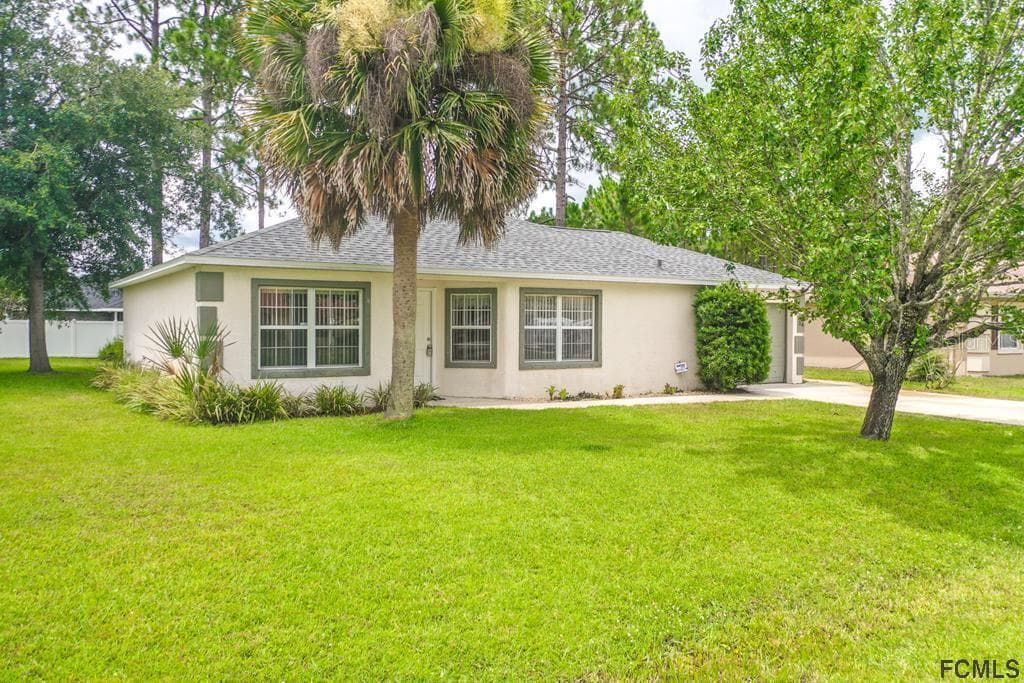 34 PINE HILL LANE PALM COAST, FL 32164
