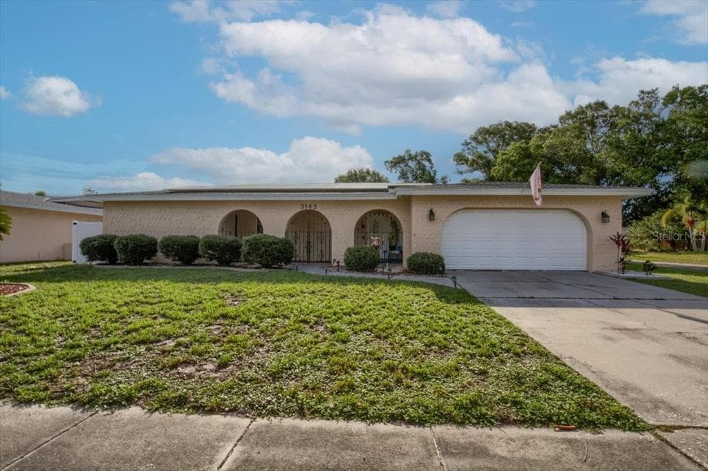 3143 FIESTA DRIVE DUNEDIN, FL 34698