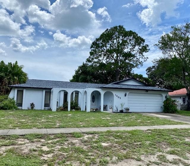 1402 RED OAK DRIVE TARPON SPRINGS, FL 34689