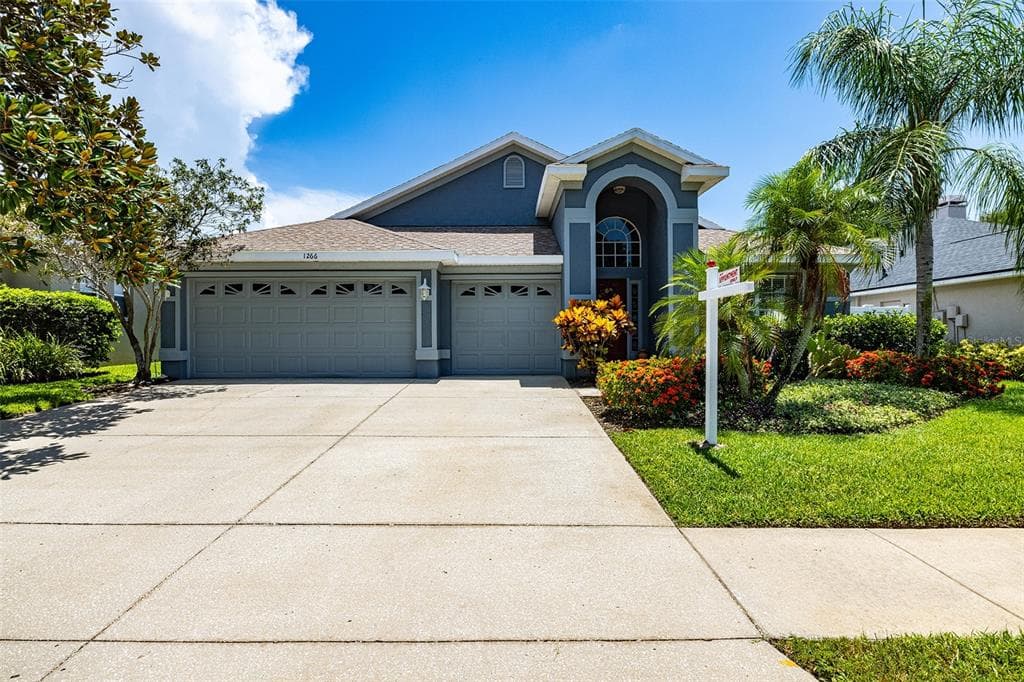 1266 PARADISE LAKE DRIVE TARPON SPRINGS, FL 34689