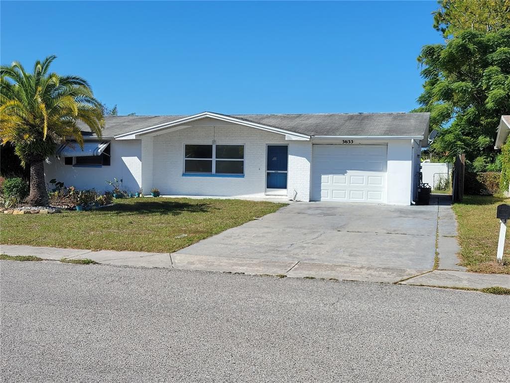 3633 WOODCOCK DRIVE NEW PORT RICHEY, FL 34652