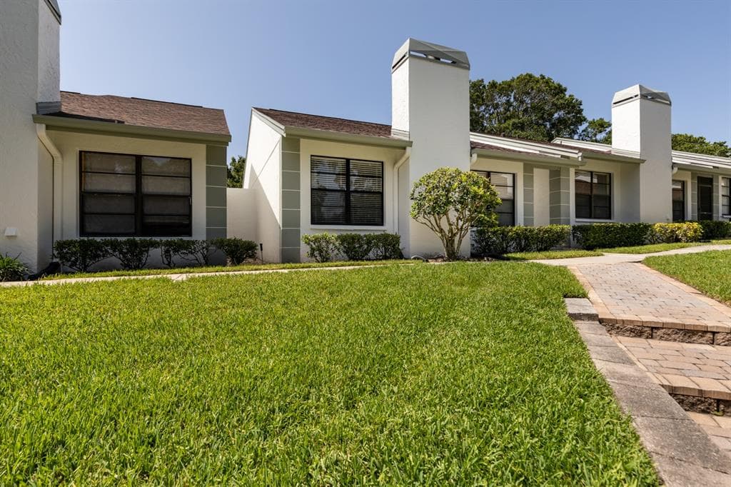 3551 MAGNOLIA RIDGE CIRCLE UNIT 702 PALM HARBOR, FL 34684