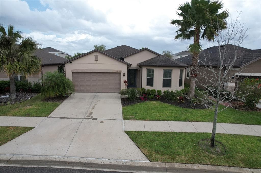 16313 TREASURE POINT DRIVE WIMAUMA, FL 33598