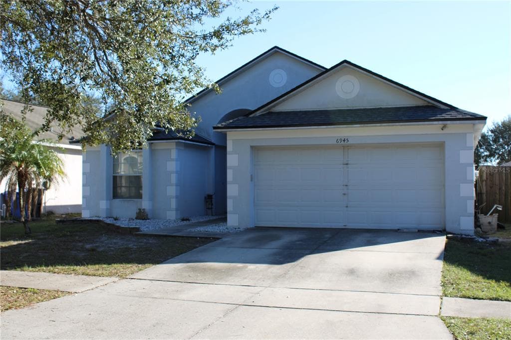 6945 CROWN LAKE DRIVE GIBSONTON, FL 33534