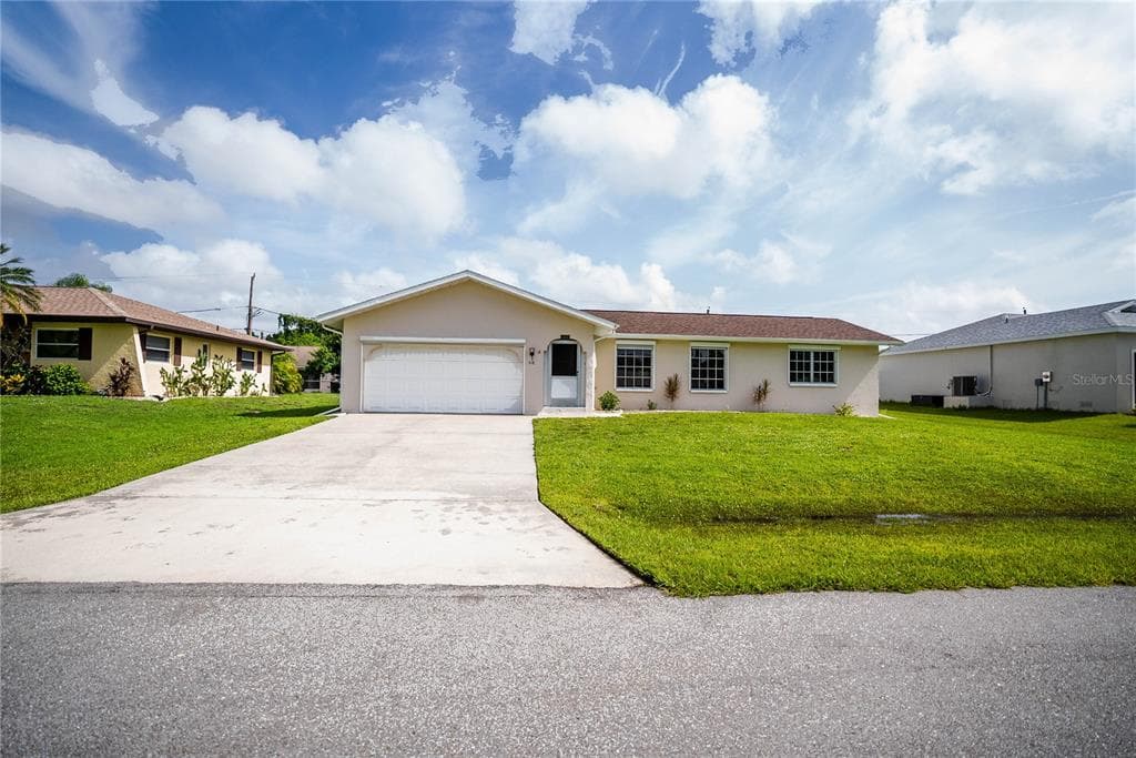 418 GARFIELD AVENUE NW PORT CHARLOTTE, FL 33952