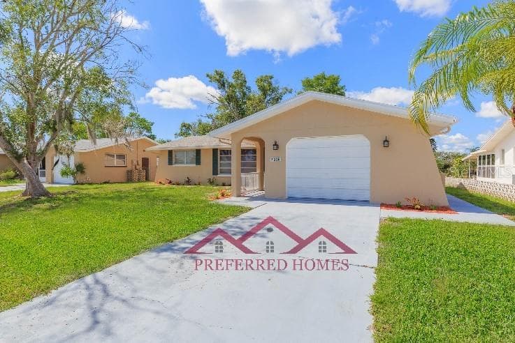 7336 CHERRY LAUREL DRIVE PORT RICHEY, FL 34668