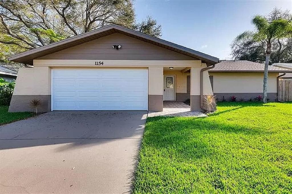 1154 BREEZE DRIVE LARGO, FL 33770