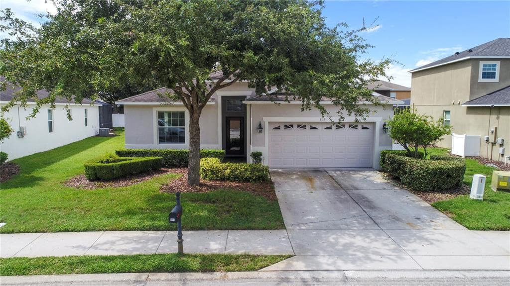 859 SUFFOLK PLACE DAVENPORT, FL 33896