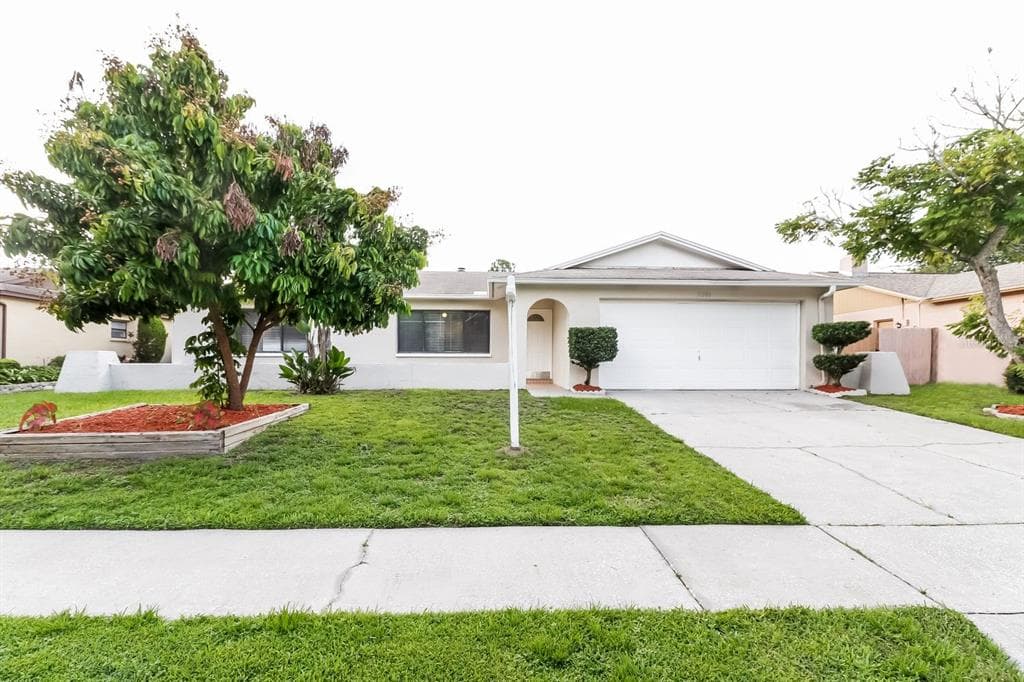 11206 WHEELING DRIVE TAMPA, FL 33625