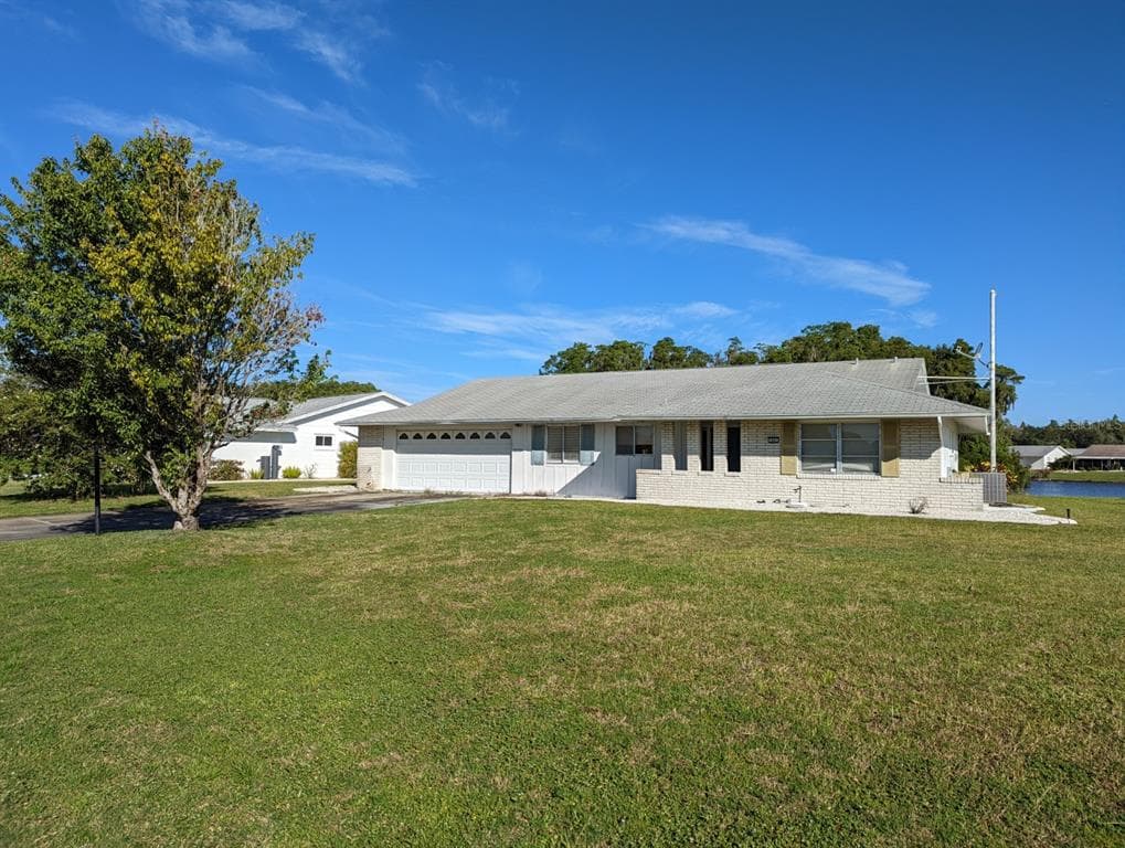 1601 MONMOUTH DRIVE SUN CITY CENTER, FL 33573