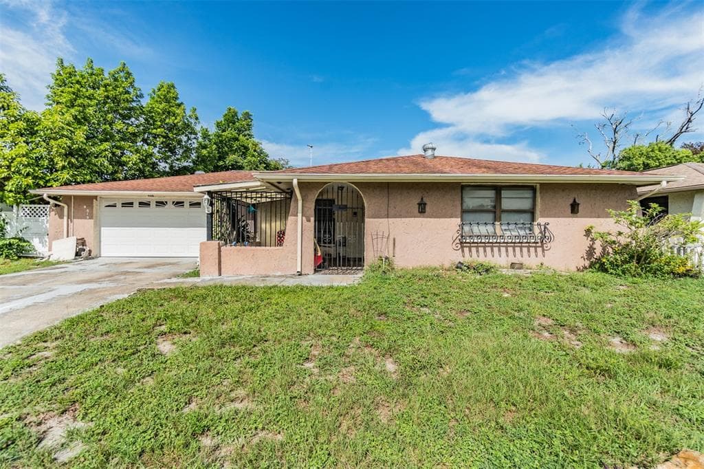 9415 LEDGESTONE LANE PORT RICHEY, FL 34668