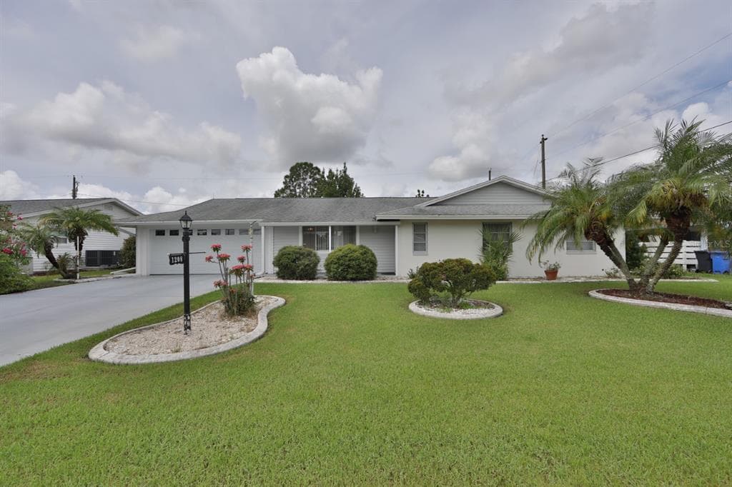 1208 HACIENDA DRIVE SUN CITY CENTER, FL 33573