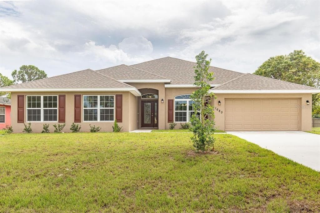 209 LAGOON MIST COURT OAK HILL, FL 32759