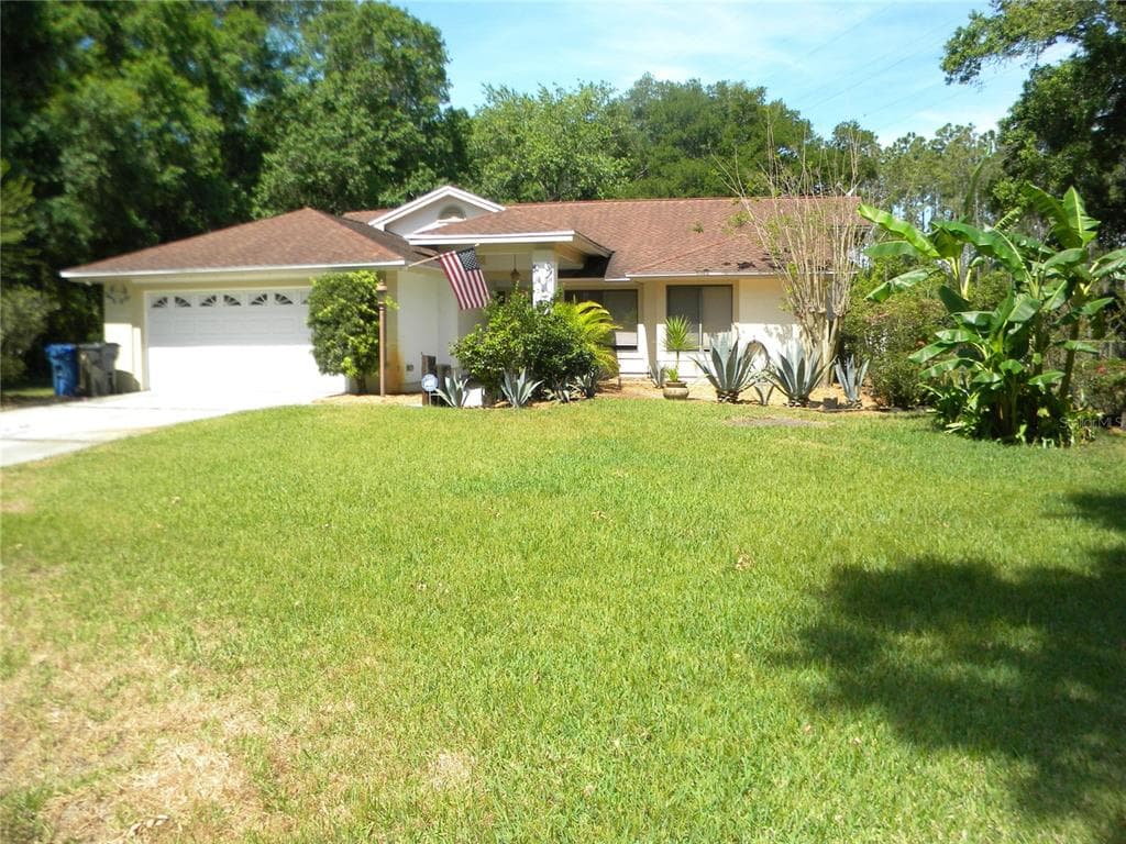 2402 BURLWOOD DRIVE LUTZ, FL 33549