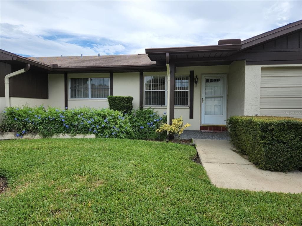 1413 HEATHER RIDGE BOULEVARD DUNEDIN, FL 34698