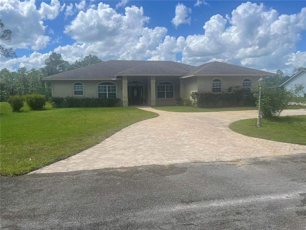 6728 AMARYLLIS DRIVE S INDIAN LAKE ESTATES, FL 33855