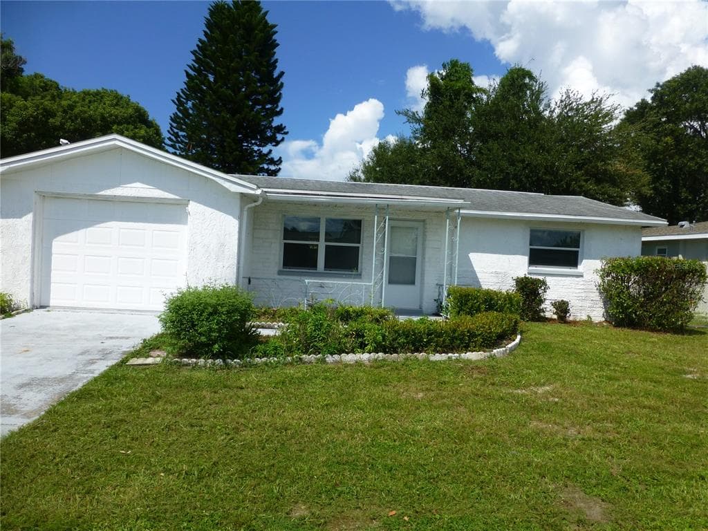 7405 OAK CREST DRIVE PORT RICHEY, FL 34668