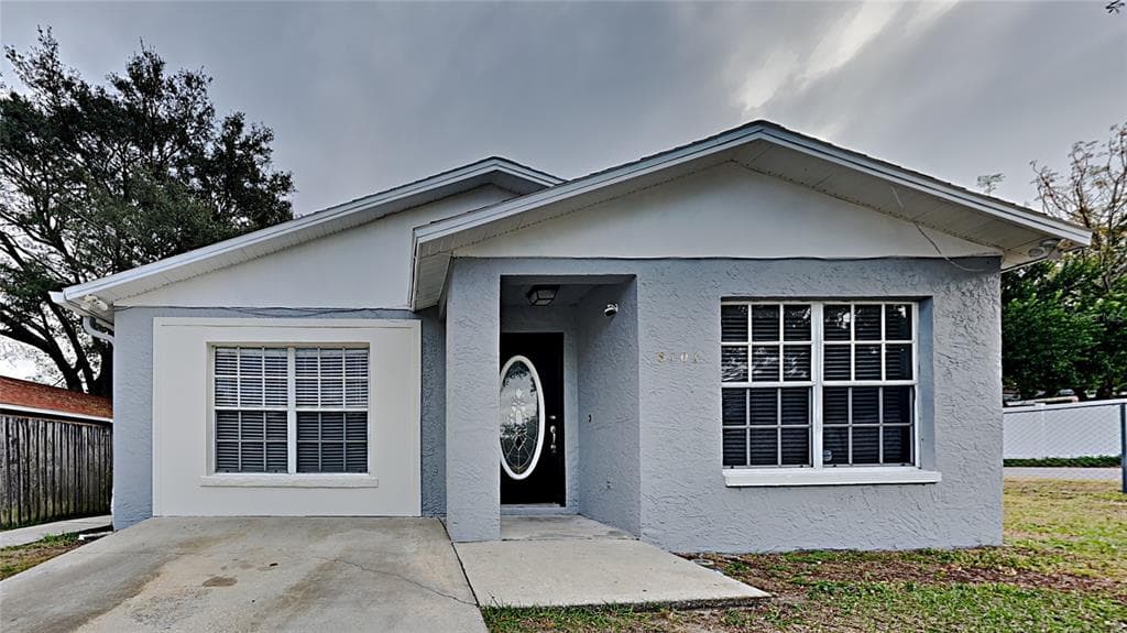 8701 N MANDARINE PLACE TAMPA, FL 33617