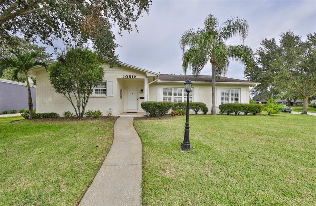 10812 CARROLLWOOD DRIVE TAMPA, FL 33618