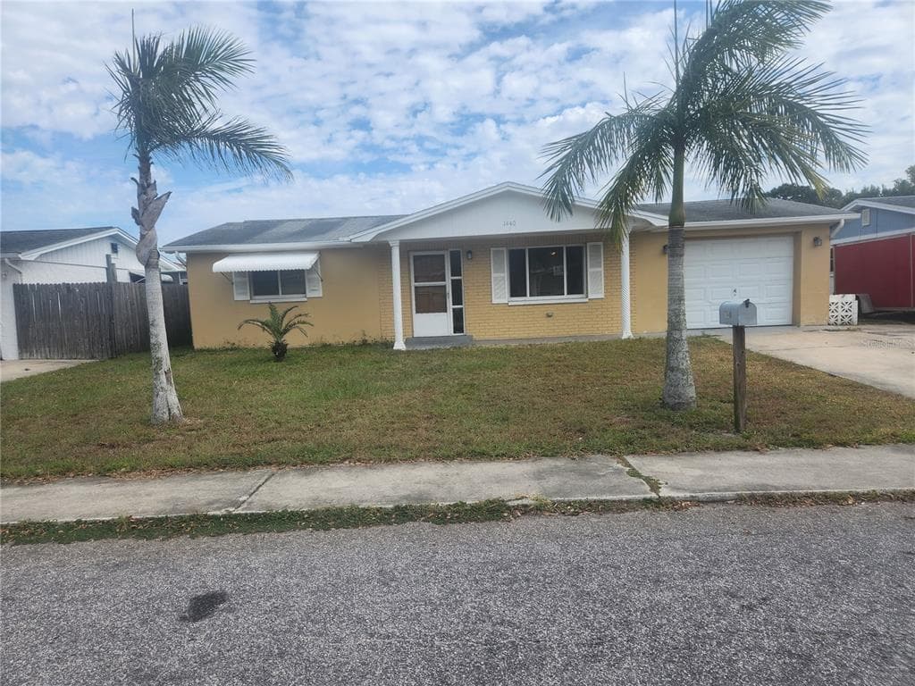 1440 WICKHAM LN HOLIDAY, FL 34691