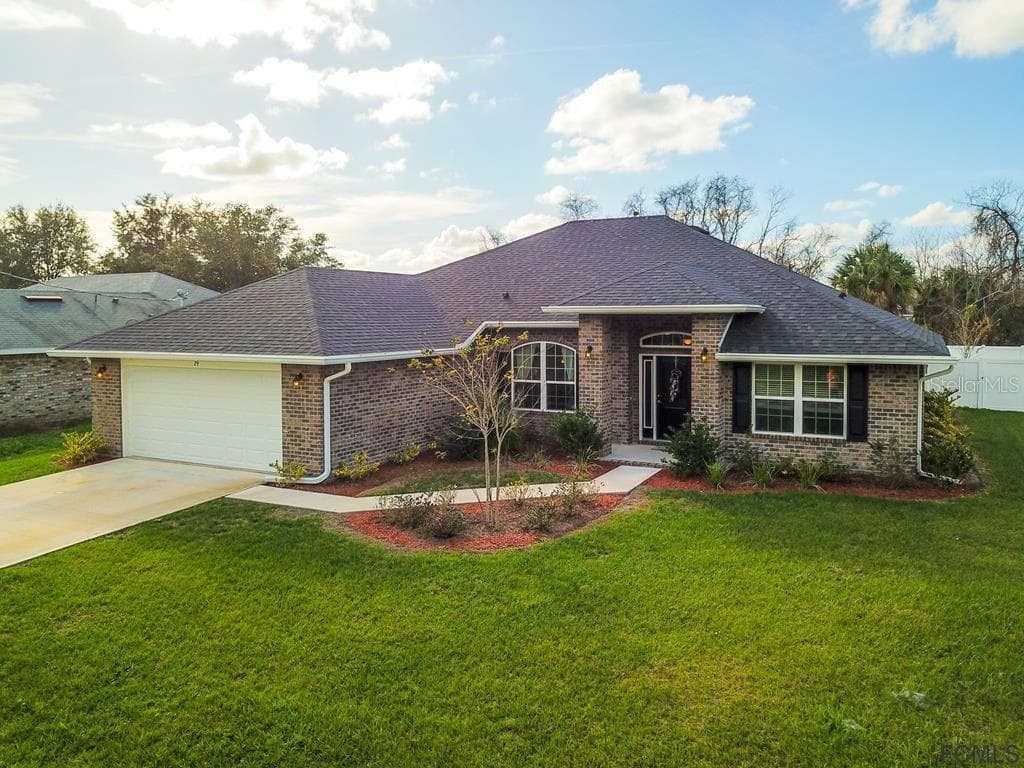 38 REGENCY DRIVE PALM COAST, FL 32164