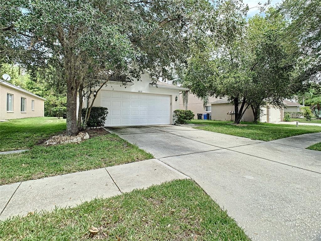 18135 SANDY POINTE DRIVE TAMPA, FL 33647