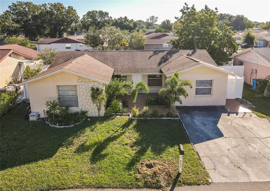 7603 WOODLAND OAKS COURT TAMPA, FL 33615