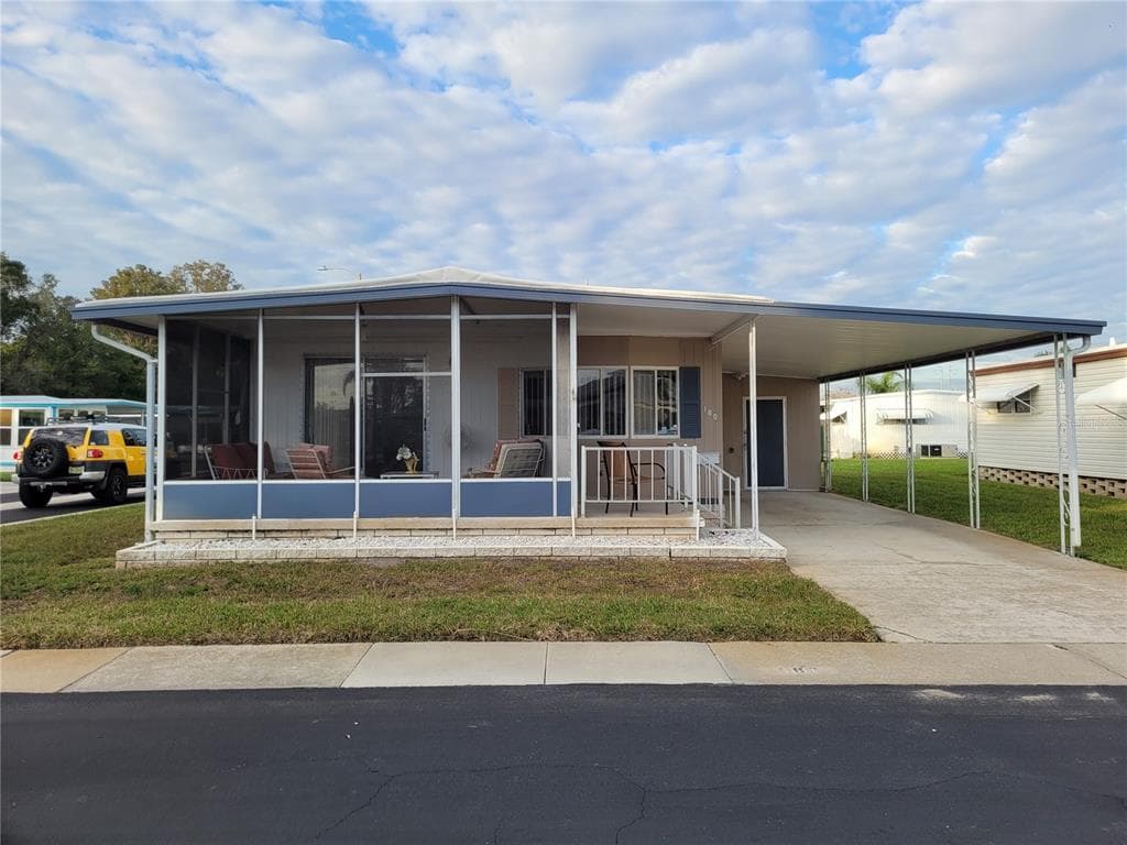 180 MELODY LANE TARPON SPRINGS, FL 34689