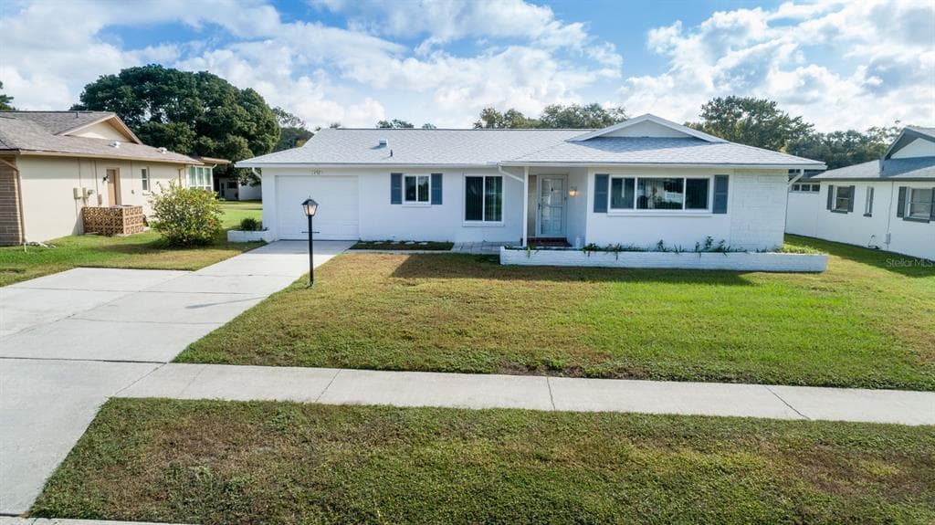 1492 DUNDEE DRIVE PALM HARBOR, FL 34684