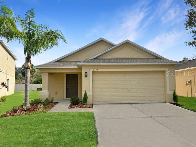 7734 MAROON PEAK DRIVE RUSKIN, FL 33573
