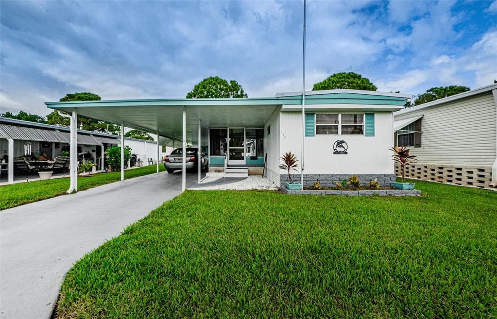 157 MELODY LANE TARPON SPRINGS, FL 34689