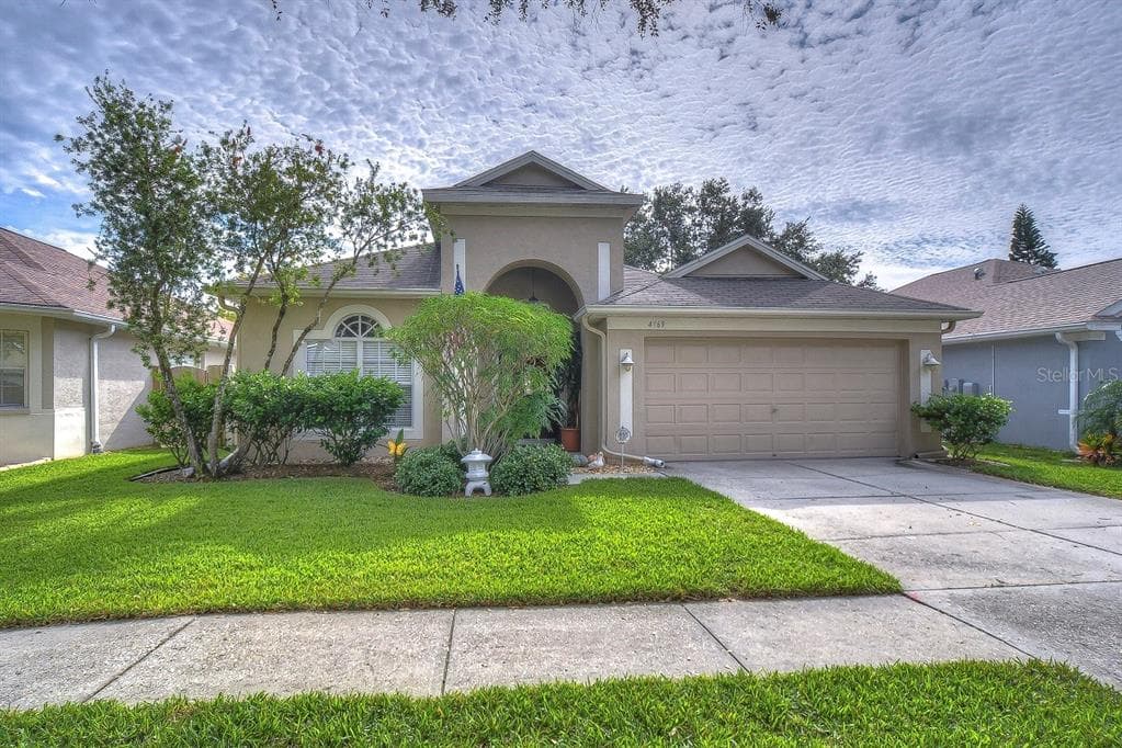 4769 WHISPERING WIND AVENUE TAMPA, FL 33614